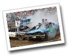 two smashed up cars billowing smoke at the Carver County Fair Demolition Derby